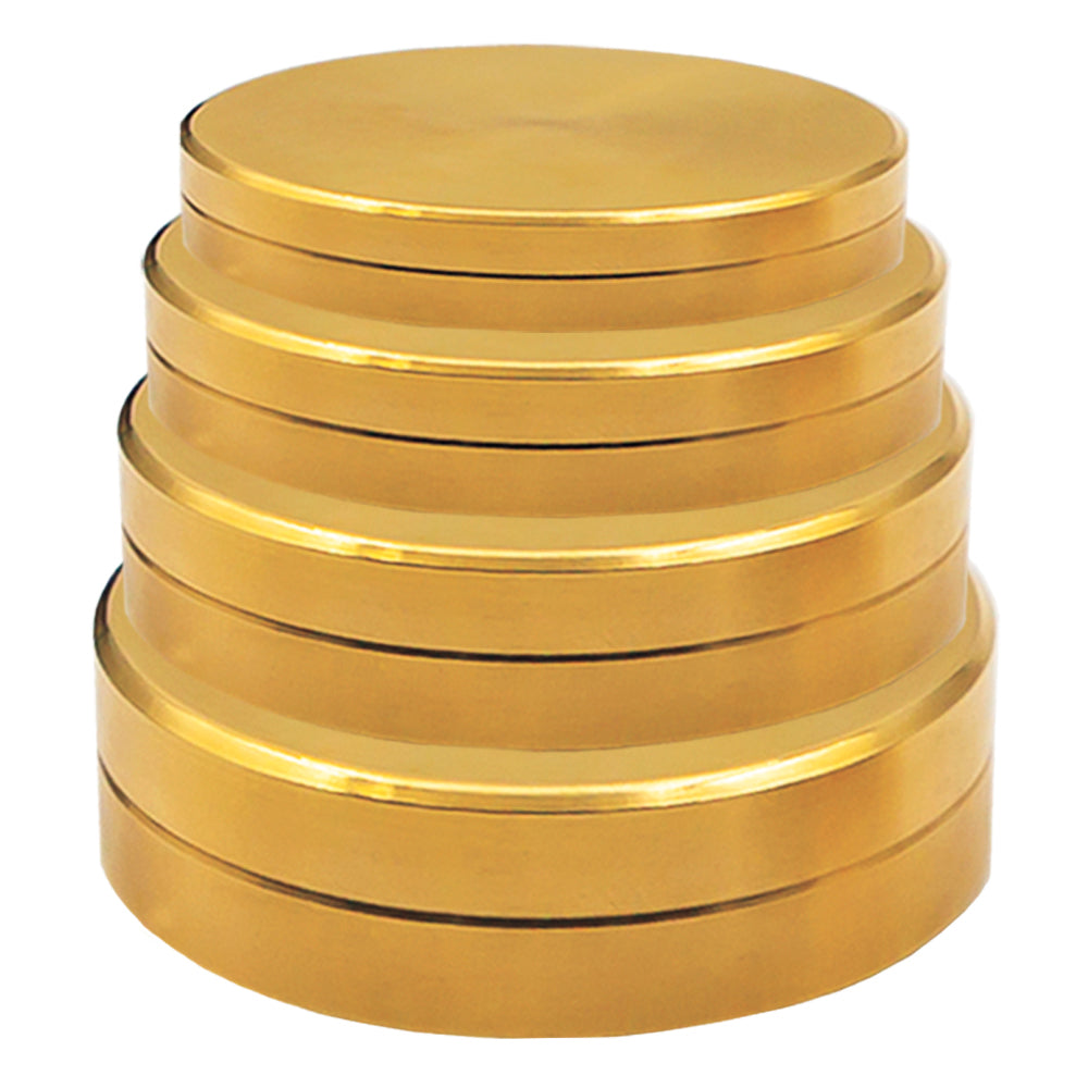 Gleaming golden nested boxes from Spellbinding Boxes, paired with a professional coin vanishing cloth for magical tricks.