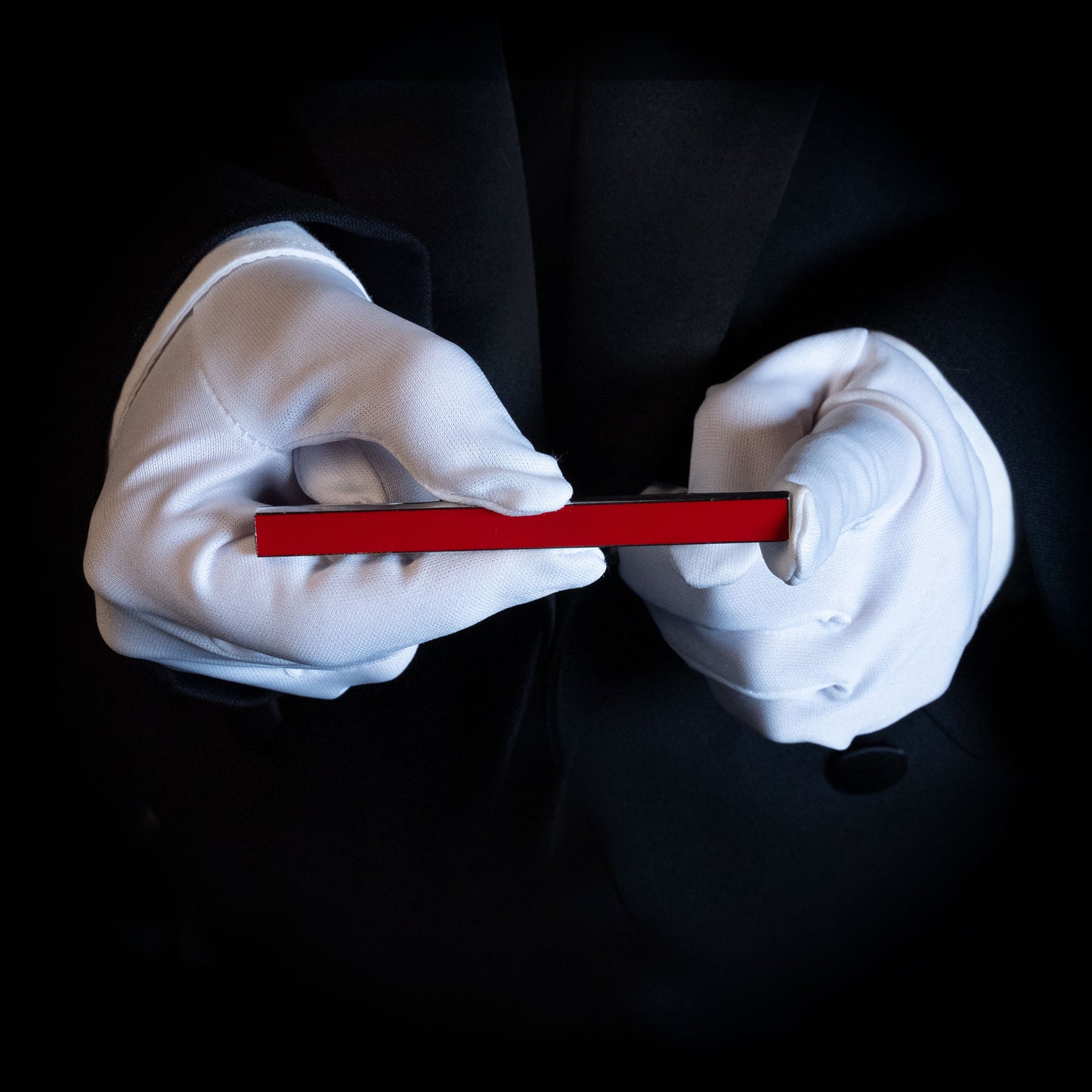 Vibrant red Metal Magic Color Stick with a sleek, polished metal and enamel finish, showcasing durability and style.