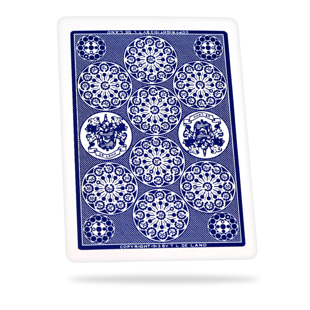 Close-up of Deland's Marked Automatic Deck in blue, showcasing a classic card design with a secret marking system for magic tricks.