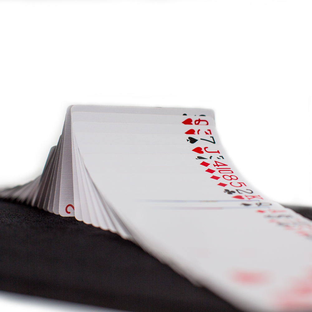 Close-up view of the Performance Pad, showcasing its soft, textured surface that grips cards perfectly for precise magic tricks.