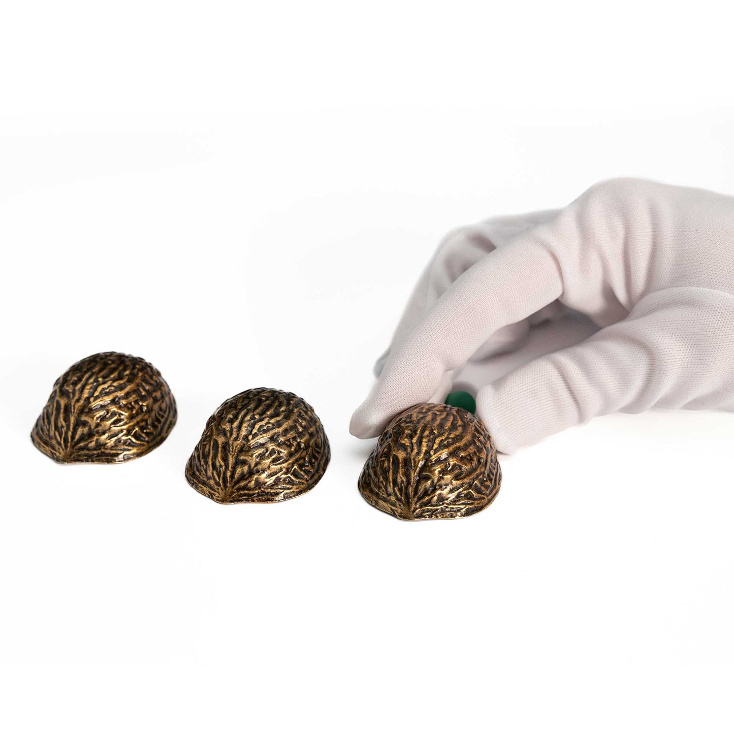 Vintage-style Metal 3 Shell Game set in antique gold finish, featuring three heavy metal shells and small green peas.