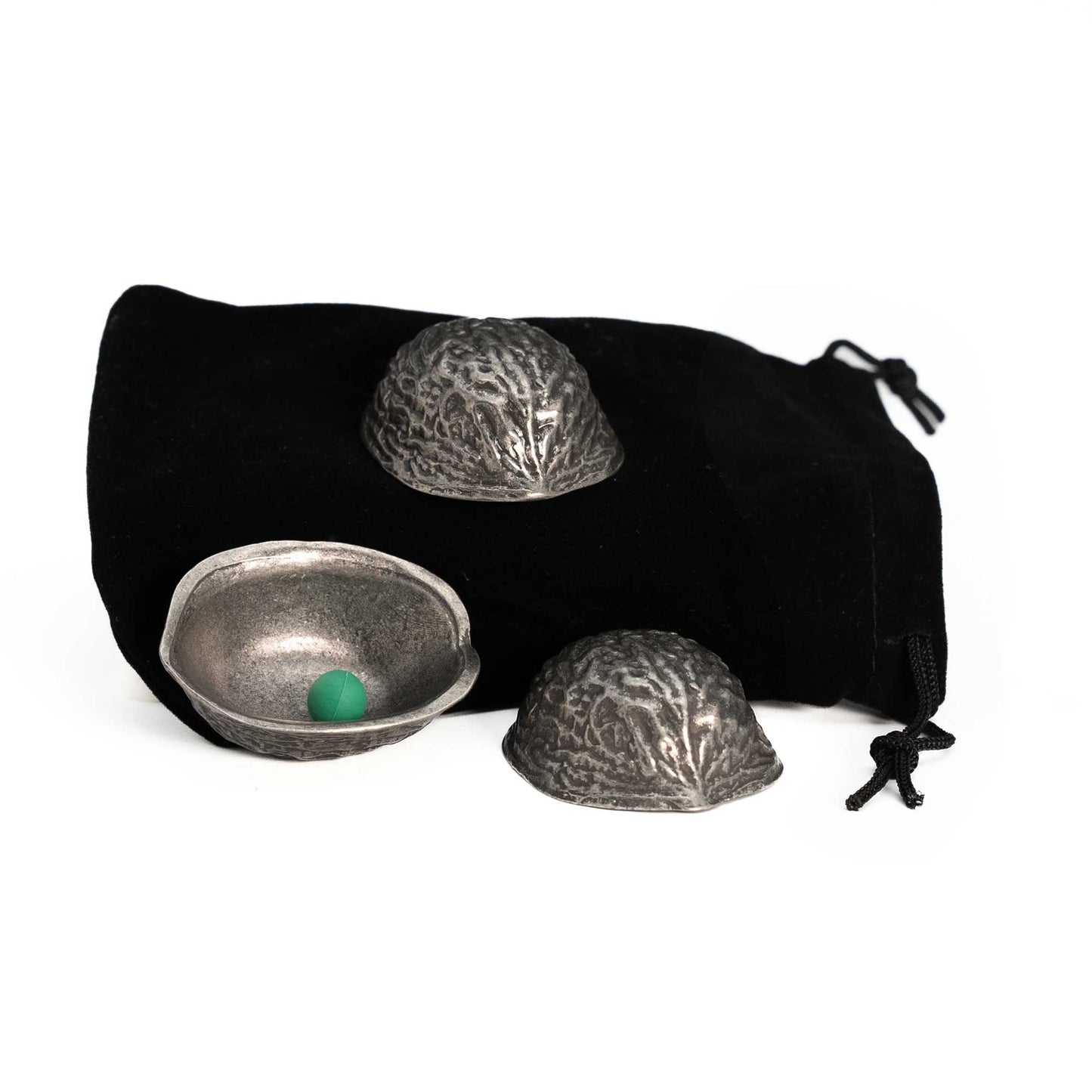 Detailed view of the Metal Antique Silver 3 Shell Game set, featuring three uniquely textured, silver-pewter plated shells and small green peas, evoking a vintage charm.