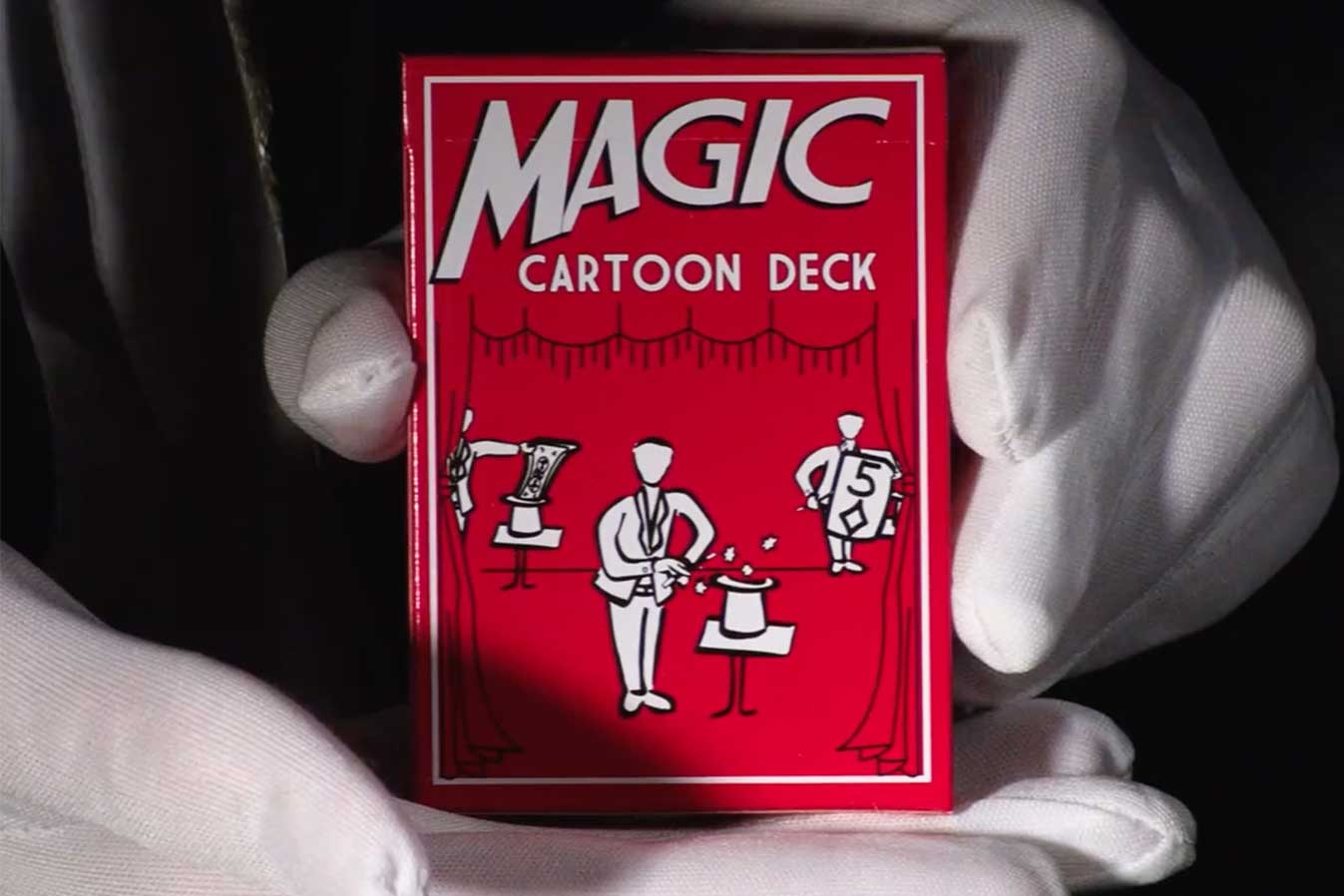 Vibrant Magic Cartoon Deck with an animated magician on the card backs, tipping his hat and performing a wand trick.