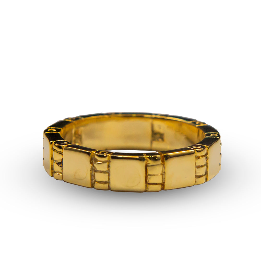 Close-up view of the Stagger Ring, a mesmerizing magic trick with three shiny rings linked on a pencil, ready to amaze.