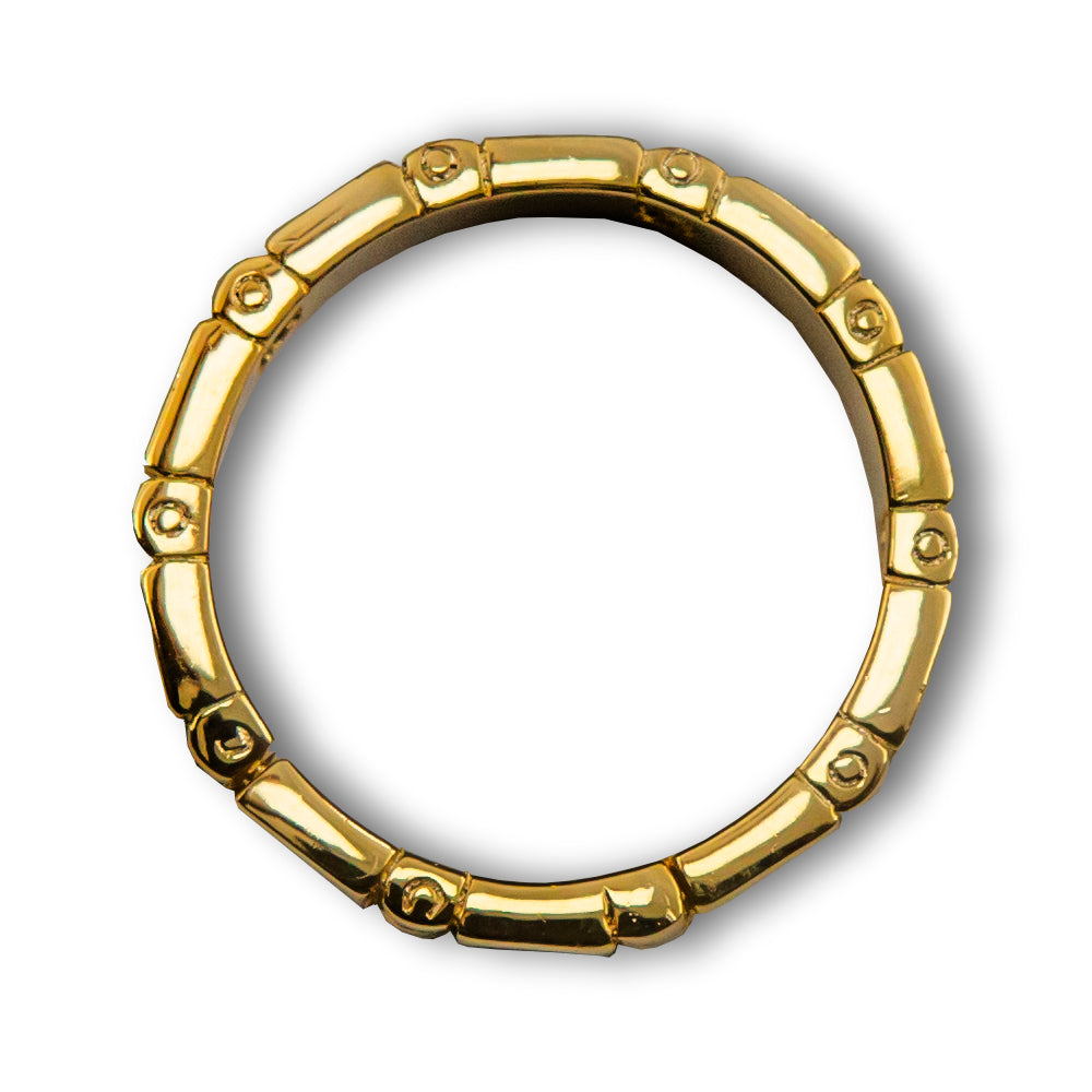Close-up view of the Stagger Ring, a mesmerizing magic trick with three linked silver rings on a pencil, ready to amaze.