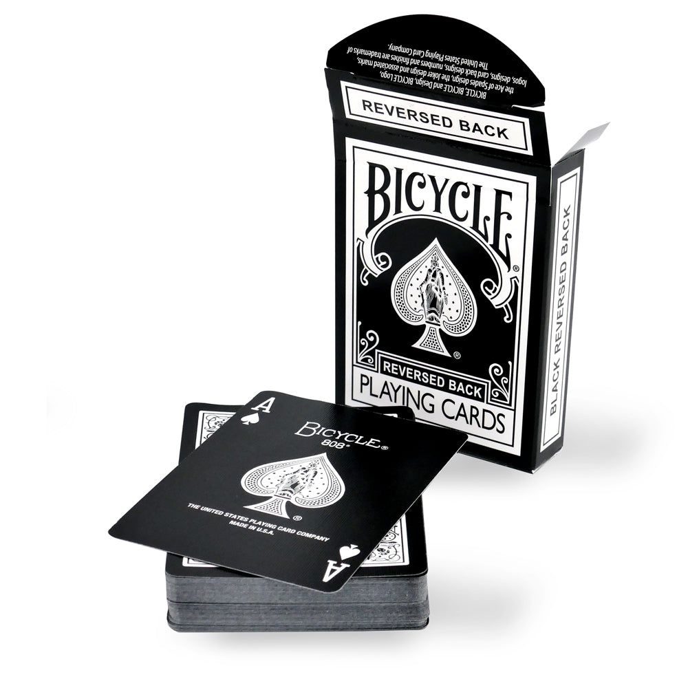 Sleek black Bicycle playing cards with striking red and white pips on full-color court cards, perfect for poker and magic tricks.