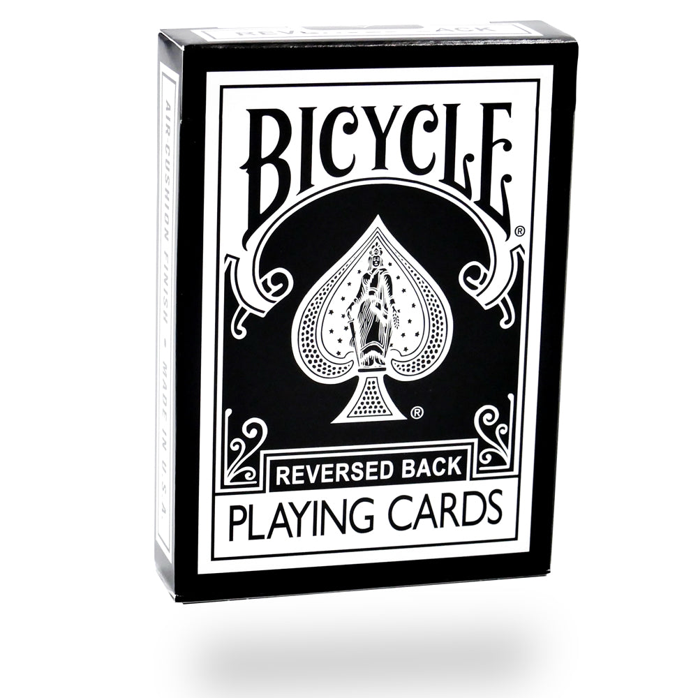 Sleek black Bicycle playing cards with vibrant red and white pips on full-color court cards, perfect for magic and poker.