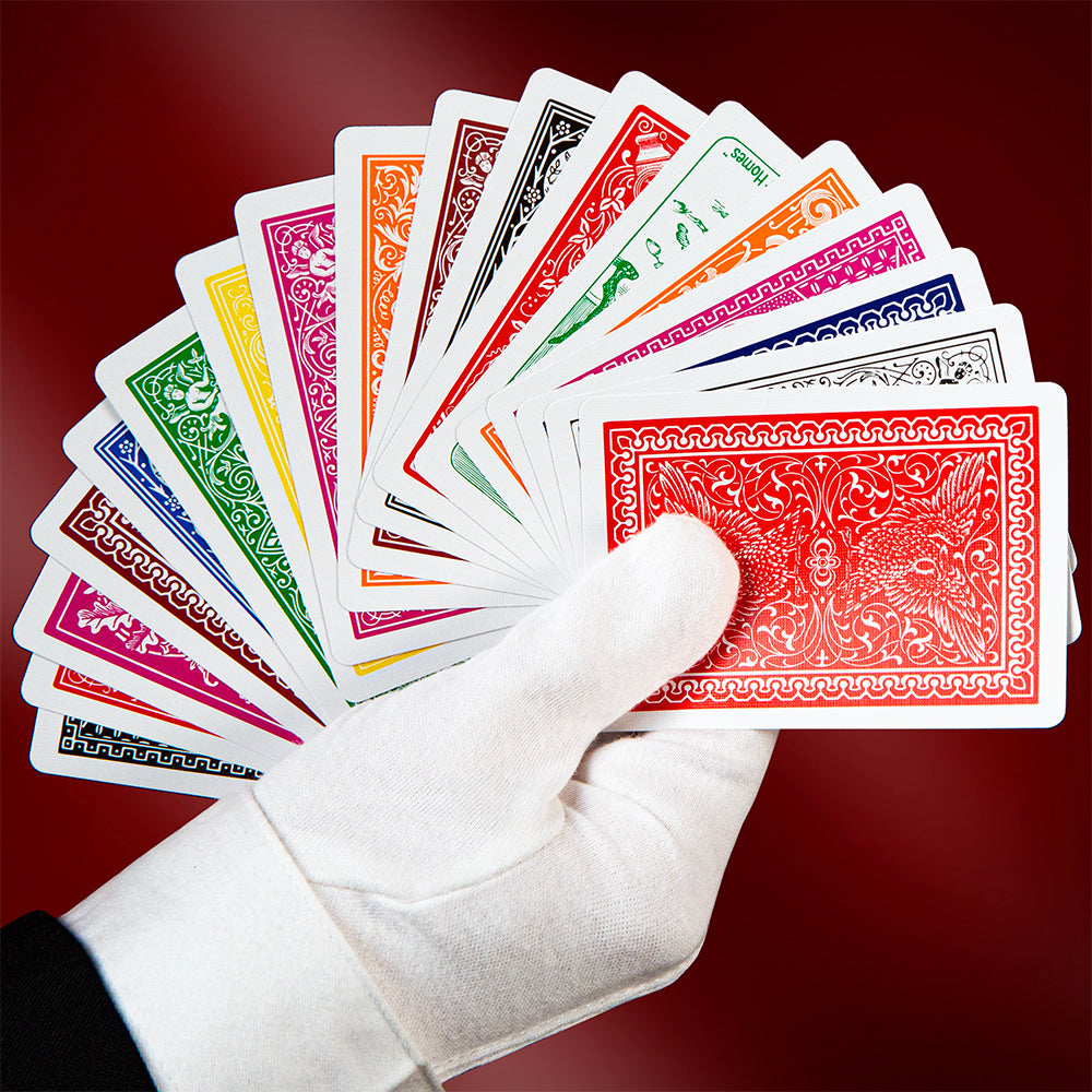Vibrant Bicycle Rainbow Deck cards fanned out, showcasing a stunning array of colorful backs for a magical card trick.