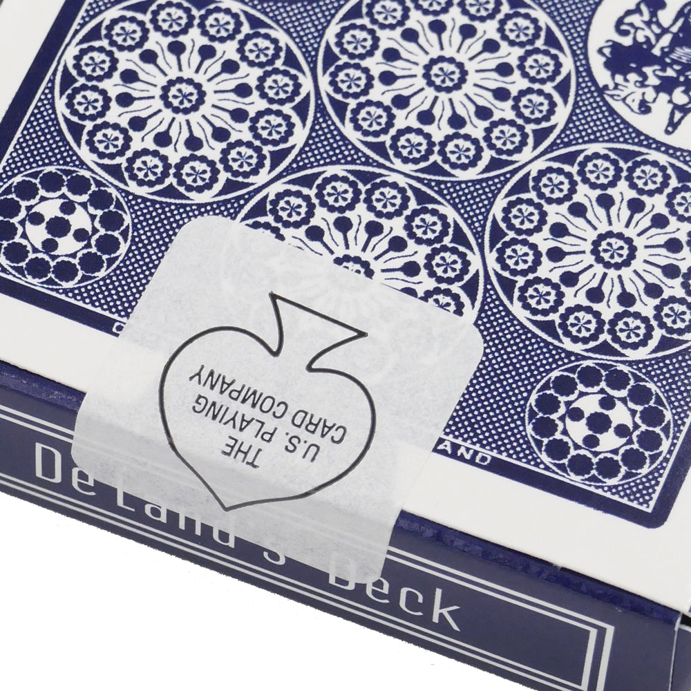 Vintage-inspired Deland's Marked $100 Deck with intricate card designs, featuring a secret marking system for magic tricks.