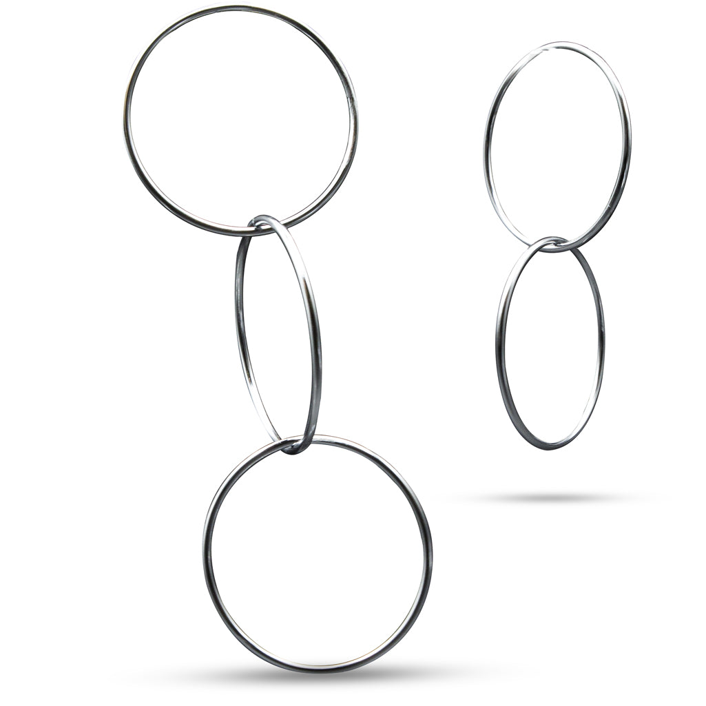 Shiny set of 8 polished Linking Rings in various sizes, showcasing seamless craftsmanship for magical performances.
