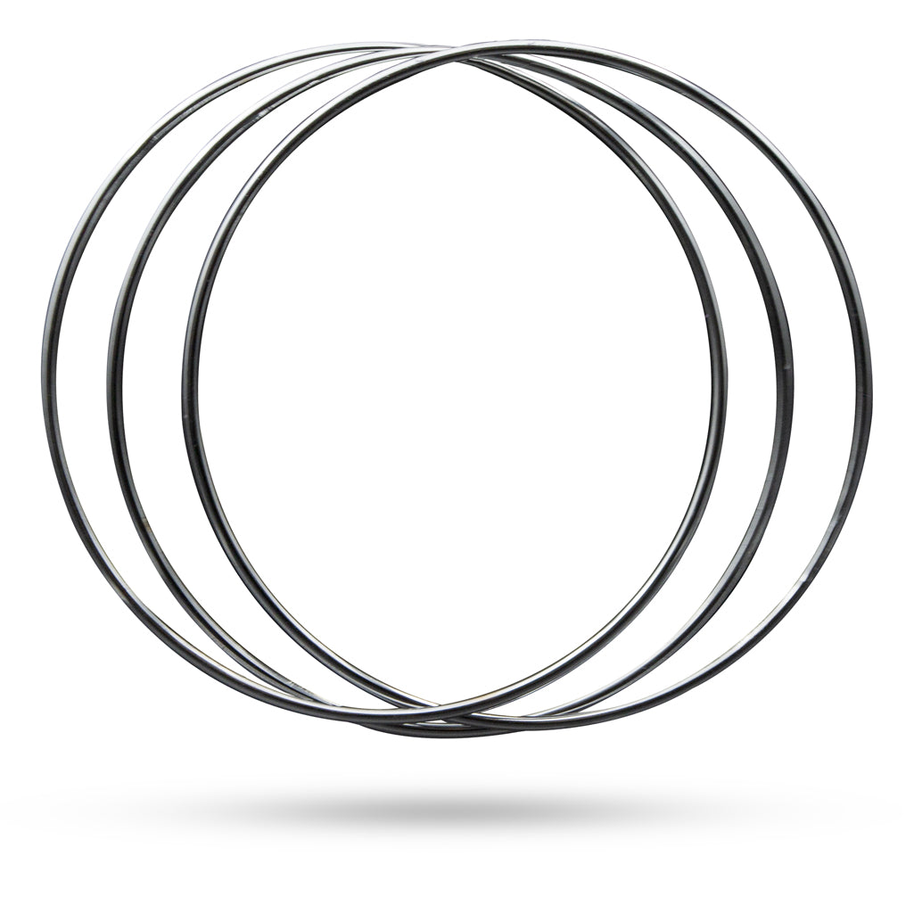 Shiny set of 8 Linking Rings in various sizes, polished to a stunning gleam, perfect for magical performances.