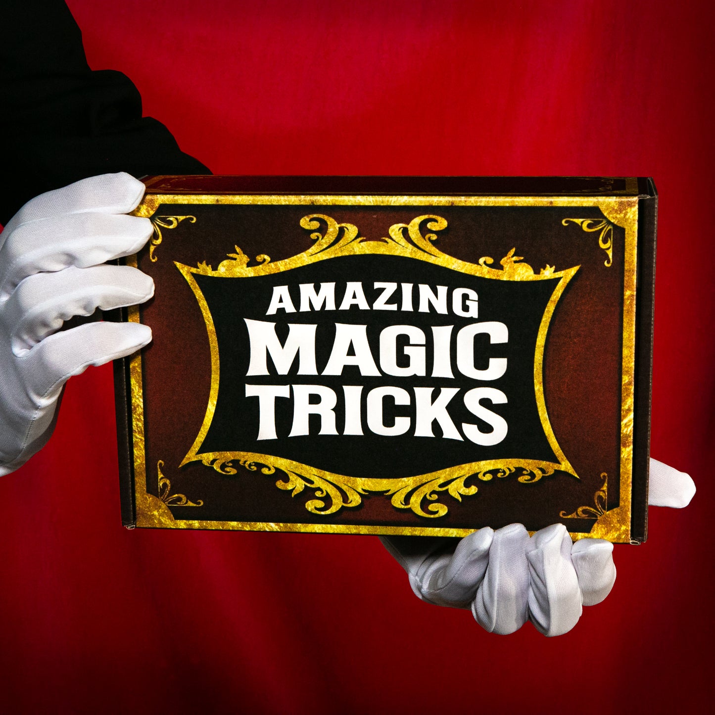 Explore the Amazing Magic Tricks Kit, packed with colorful props like the Magic Cartoon Deck and Secret Cups for aspiring magicians.