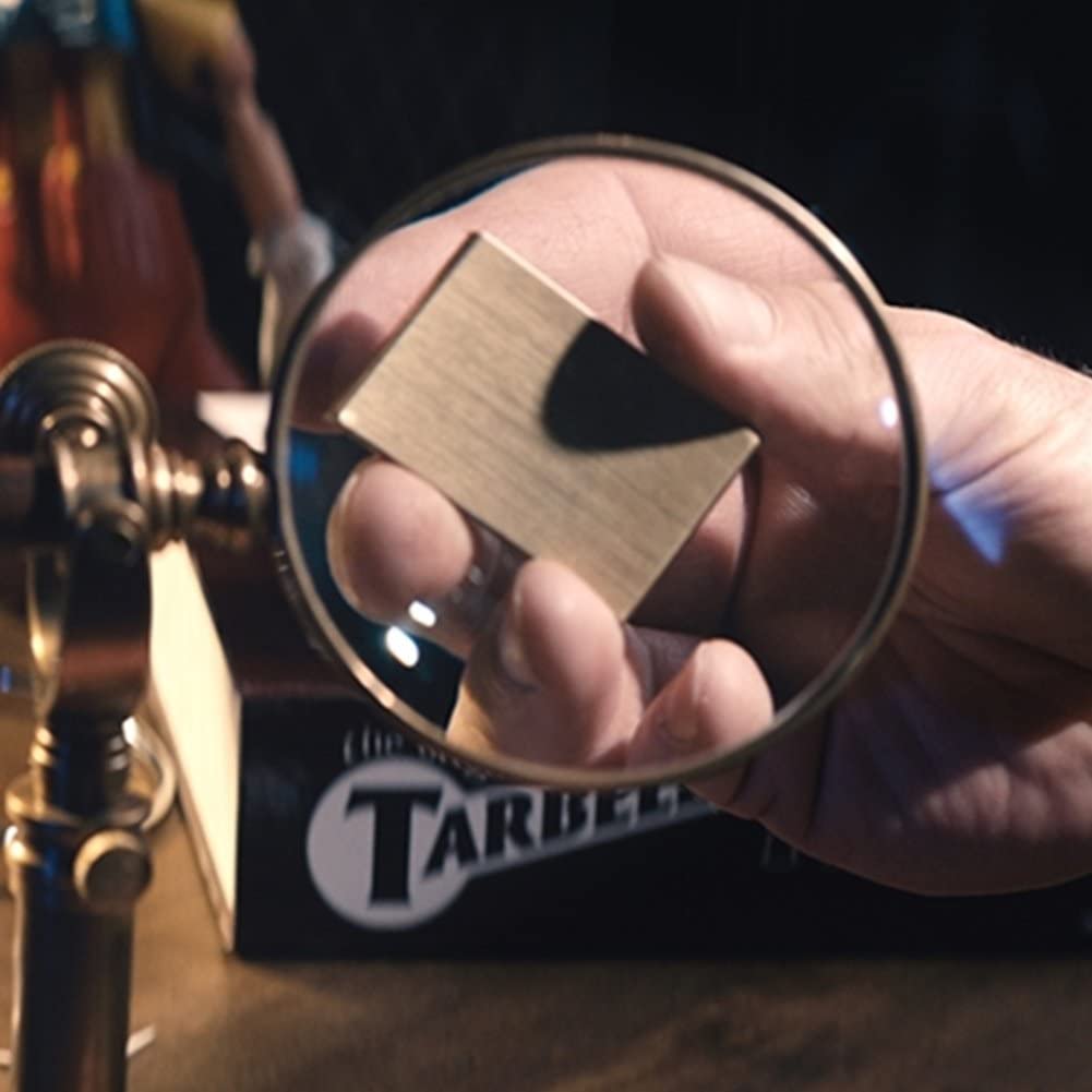 Close-up of The Matchbox Mystery, a pocket-sized magic trick with a matchbox and toothpick, showcasing a mind-bending illusion.