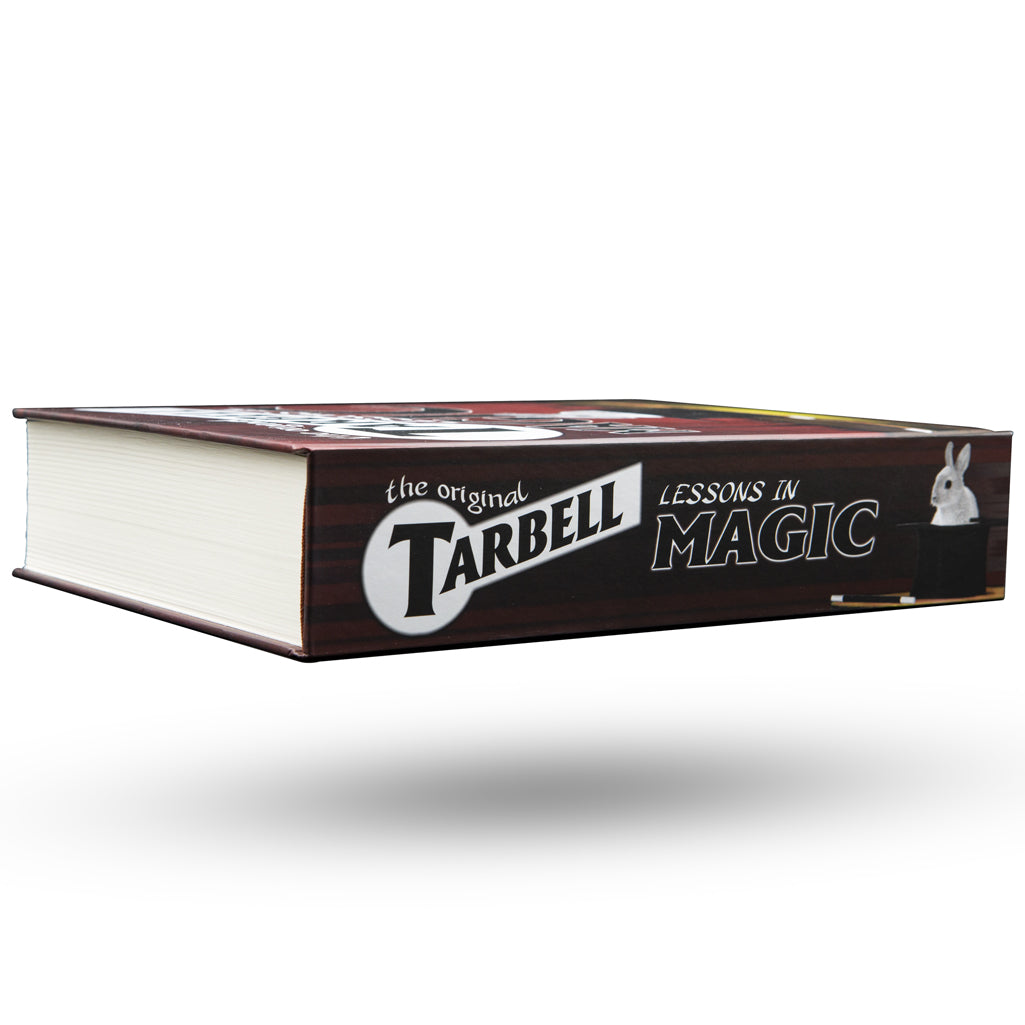 Vintage-style Tarbell Course In Magic book with a hardbound cover, showcasing 900 pages of classic magic lessons and illustrations.