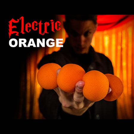 Bright orange sponge balls with a soft, grippy texture, perfect for magic tricks, displayed in a sleek black box.