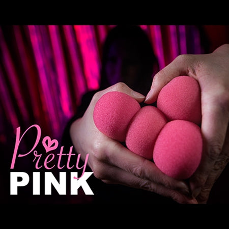 Vibrant pink sponge balls with a soft, grippy texture, displayed in an elegant black box with open windows for easy viewing.