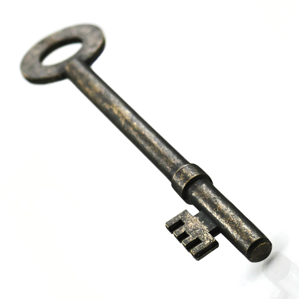 Close-up of The Haunted Key, a mysterious metal key that appears to move on its own, perfect for mind-bending magic tricks.