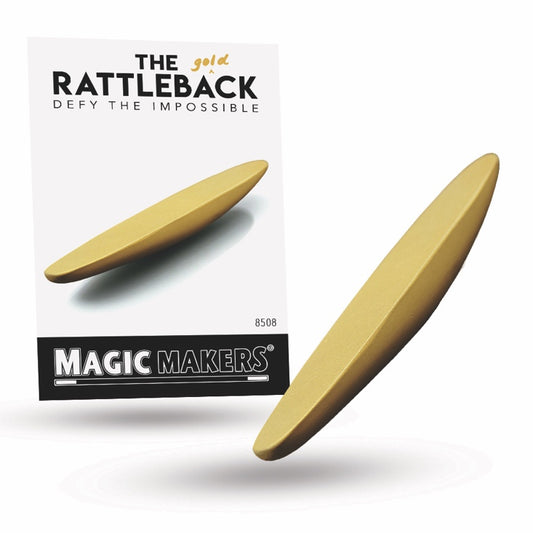 Gleaming gold Rattleback toy in alloy, showcasing a mesmerizing spin-reversal effect on a smooth surface.