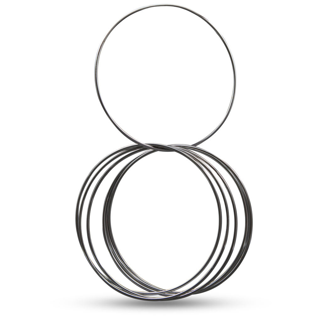 Shiny set of 8 Linking Rings in various sizes, polished to a stunning gleam, perfect for magical performances.