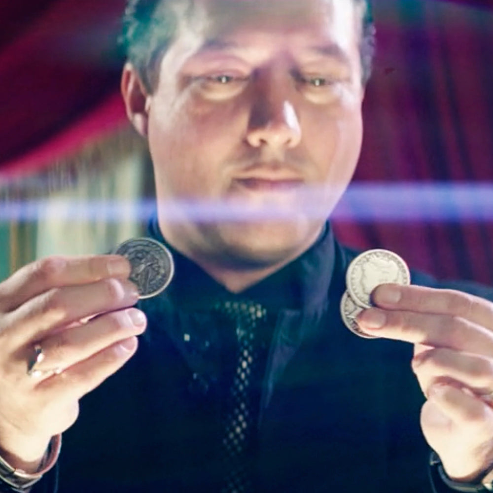 Stunning set of Illusion Coins Pro Model, featuring three heavy 1.5-inch coins and a clever coin shell for magic tricks.