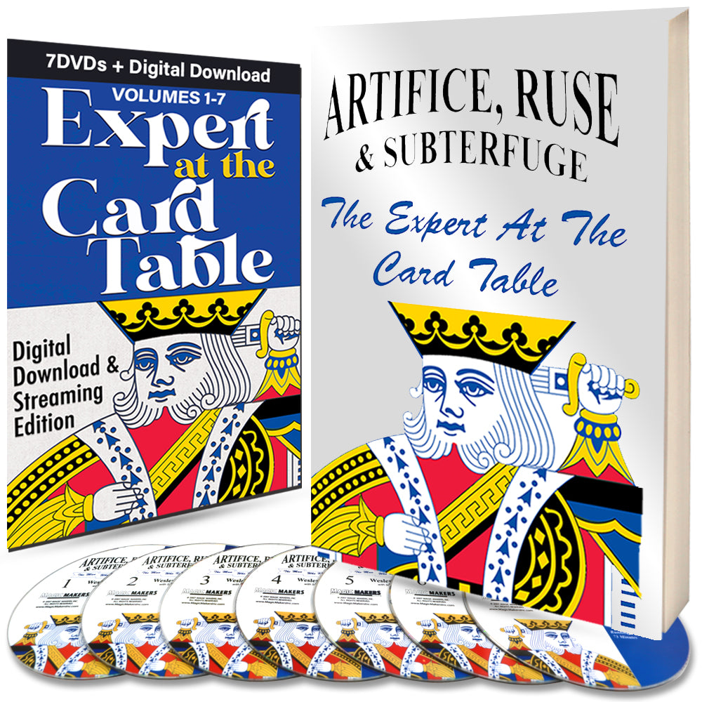 Detailed view of the Expert Card Magic Kit, showcasing a Blue Faded Bicycle Deck, a wooden illusion card box, and a comprehensive magic training book with DVDs.