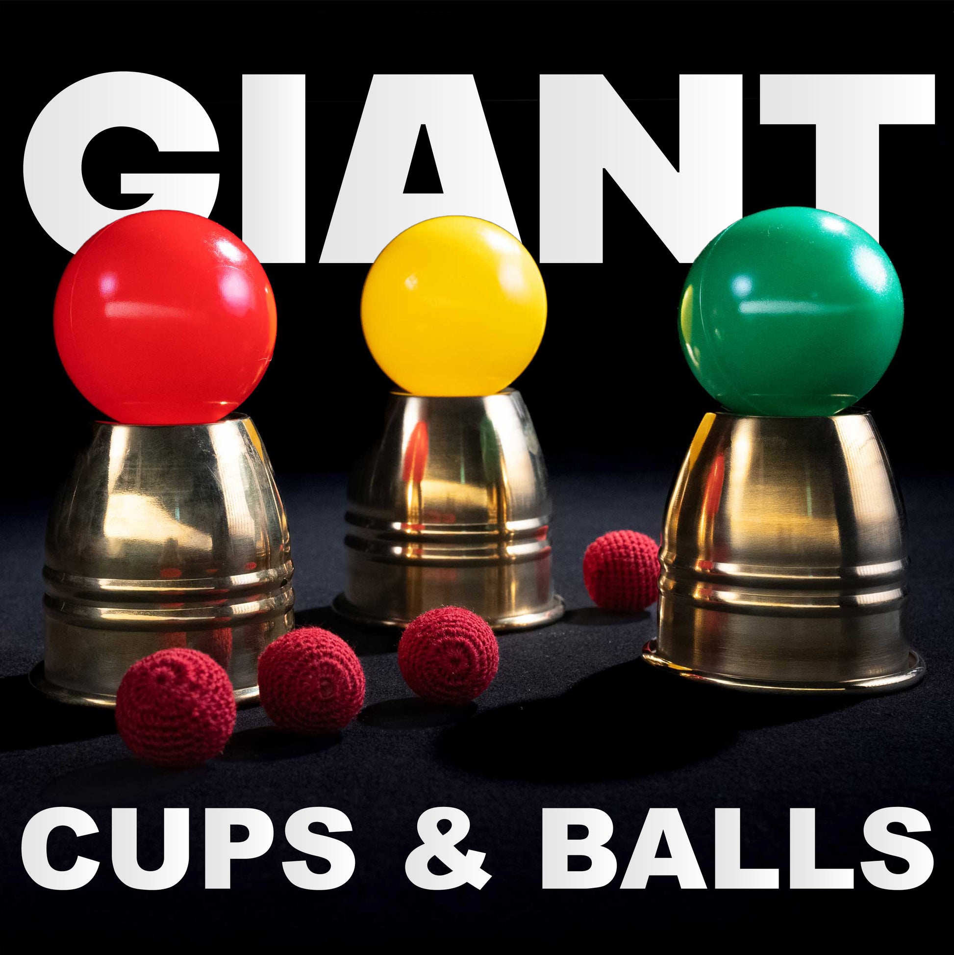 Three giant alloy metal cups with four large crochet knit balls, perfect for a dramatic stage magic cups and balls routine.