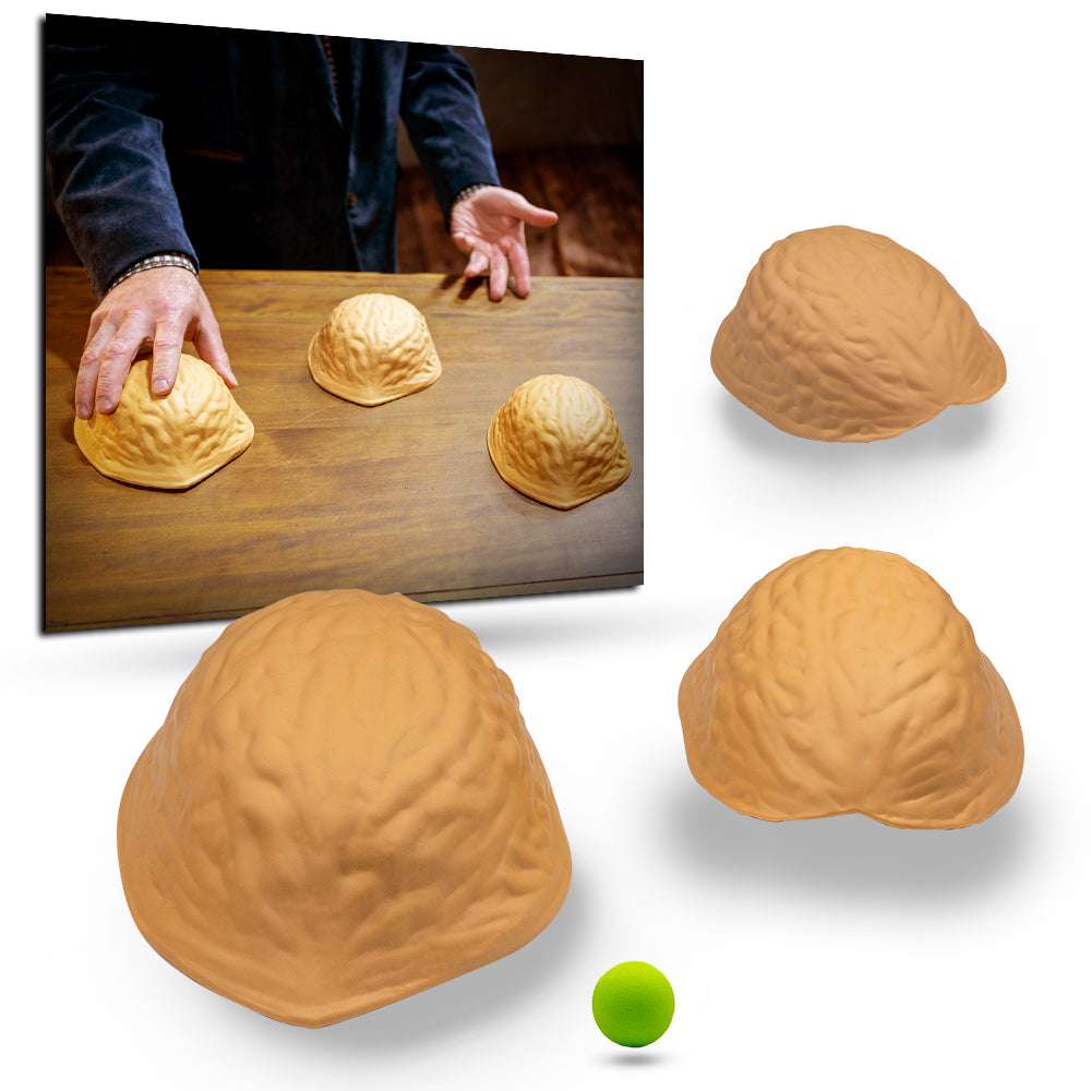 Close-up of the Magic Makers Giant Three Shell Game, featuring three massive, durable shells and a vibrant green pea for captivating magic tricks.