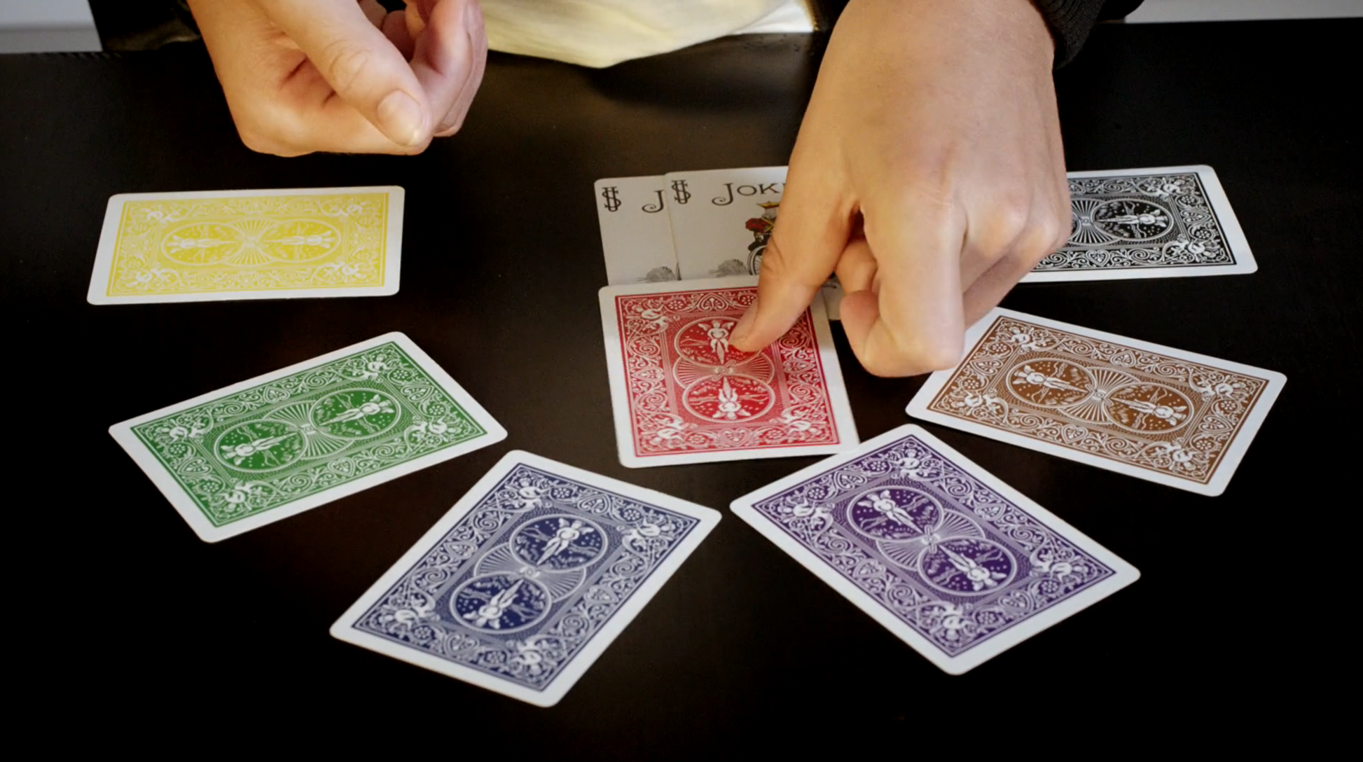 Color Aces Card Trick by Magic Makers — watch four piles of cards transform to reveal a matching color ace in each pile.