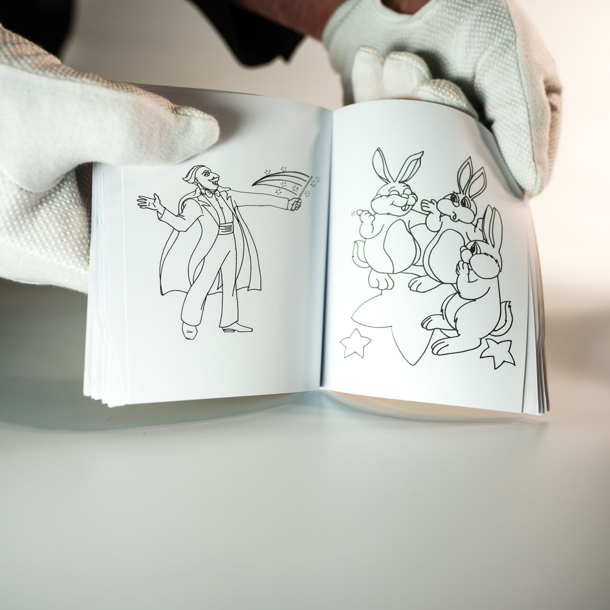Magic Makers Pocket Coloring Book magic trick showcasing a fourth product view of the pocket-sized coloring book prop for a captivating close-up magic performance.