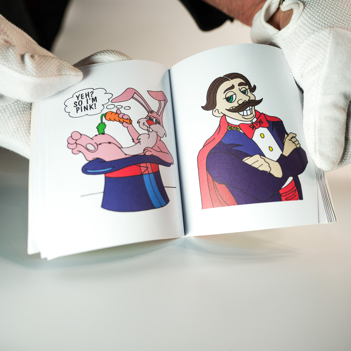 Magic Makers Pocket Coloring Book magic trick featuring a third product view of the pocket-sized coloring book prop for a stunning close-up magic performance.