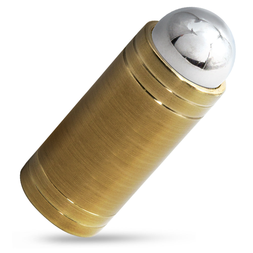 Silver ball mysteriously sinking through a solid brass bar in the captivating Ball Thru Bar Illusion magic trick.