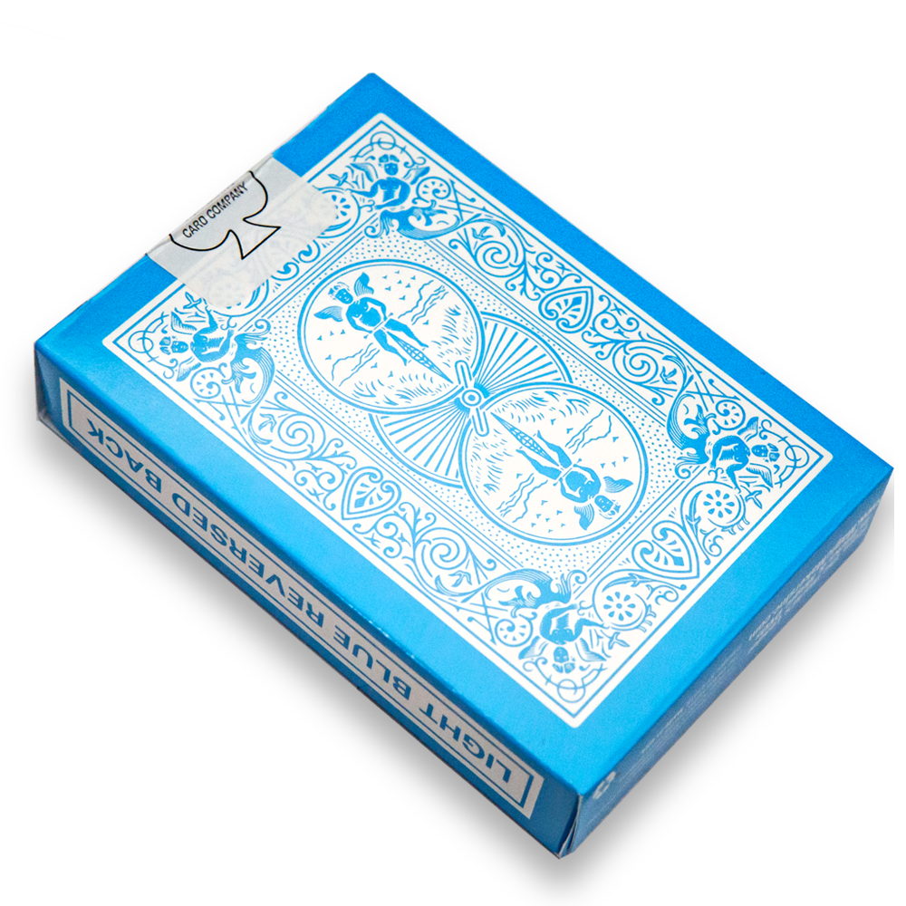 Vibrant light blue Bicycle playing cards with striking black and white pips on full-color court cards, ideal for magic tricks.
