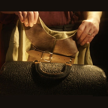 Vintage-style canvas straitjacket in a classic 19th-century design, inspired by Harry Houdini’s iconic escape trick.