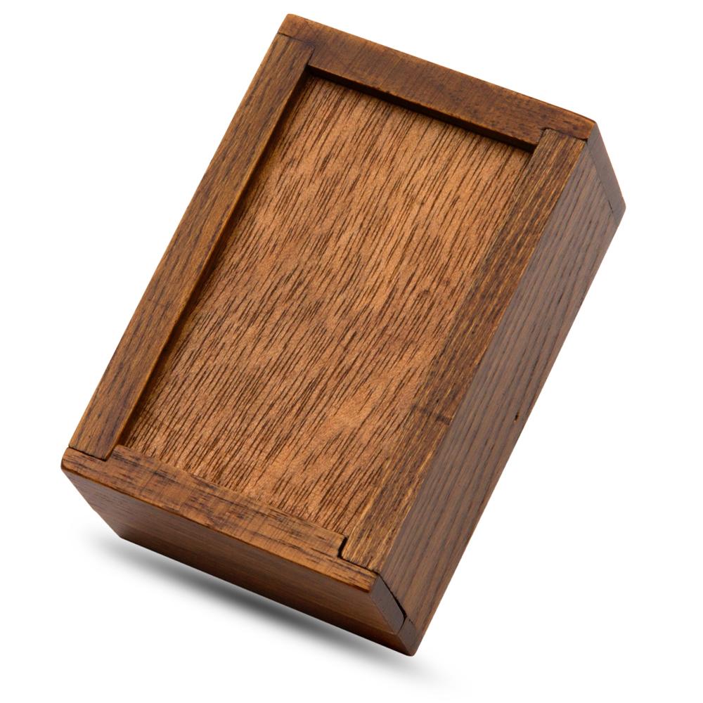 Close-up of the Vanishing Box Premium, a sleek hardwood rattle box for magicians, perfect for vanishing small objects like coins.